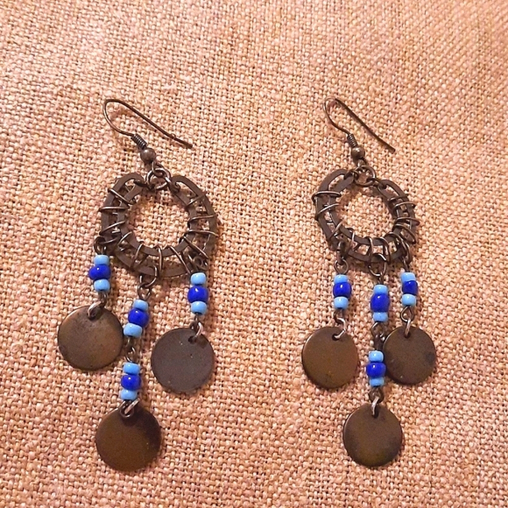 Metal and blue dangle earrings